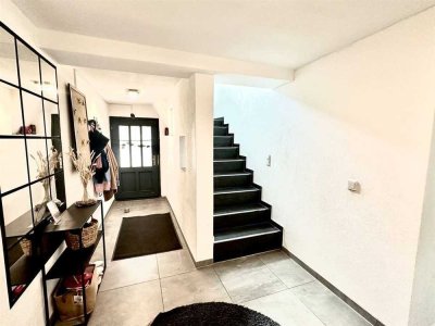Familienfreundliches Haus mit 6 Zimmern, Garage und Terrasse