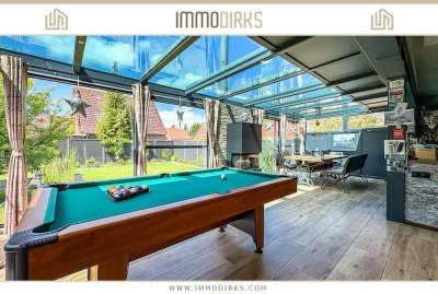Pewsum: 
Hochwertig modernisiertes Zuhause mit Wintergarten, Koi-Teich & viel Privatsphäre
