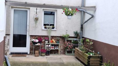 Gepflegte 2-Zimmer Maisonette-Wohnung mit Terasse und Garten