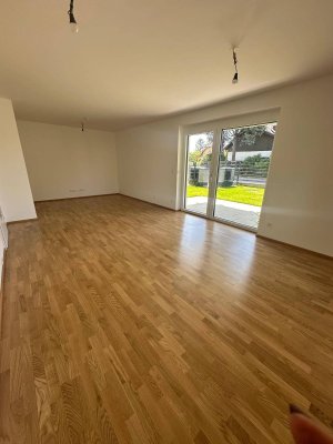 Ein Wohnjuwel der Extraklasse – Exquisite 3-Zimmer-Gartenwohnung mit sonniger Terrasse und traumhaftem Südgarten
