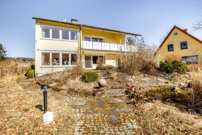 Lichtdurchflutetes, großzügiges Zweifamilienhaus mit traumhafter Aussicht