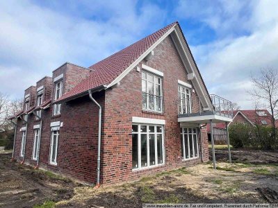 Neubau-Erstbezug! 3-Zimmer-Erdgeschosswhg. mit Terrasse und Carport in Westerloy