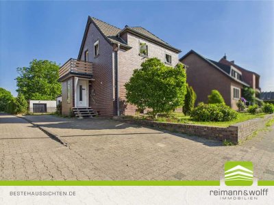 REIMANN&WOLFF Waldfeucht-Haaren: "Charme trifft Freiraum – Ihr Zuhause mit Grün."