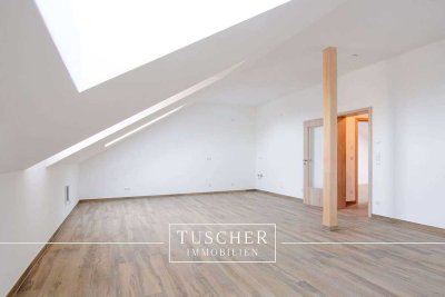 Erstbezug - Attraktive DG-Wohnung im Grünen!