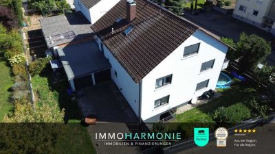Kapitalanlage und/oder Eigennutzung: 3 Wohneinheiten mit Doppelgarage, Stellplätzen und Garten