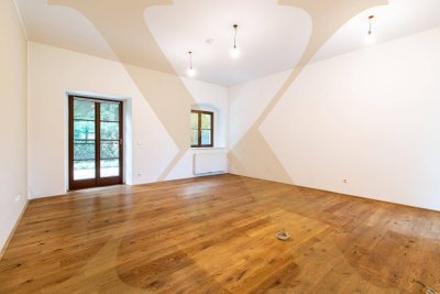 Charmante 2,5-Zimmer-Wohnung mit gemütlichem Eigengarten im Palais Löwenfeld ab sofort zu vermieten!