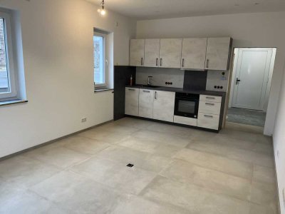 Stilvolle 1 Raum EG Wohnung NEUBAU mit gehobener Innenausstattung mit EBK in Gummersbach Berghausen