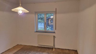 4 ZKB-Wohnung mit Stellplatz, Balkon und Garten in Dielkirchen zu vermieten.