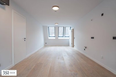 Urbaner Wohnkomfort mit Charme und Grünblick – stilvolle 3-Zimmer-Wohnung mit Balkon in ruhiger Innenhoflage