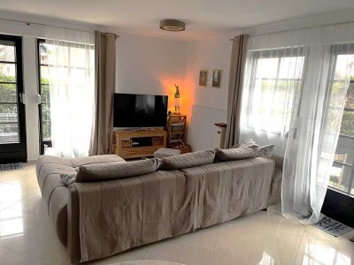 Maisonette-Eigentumswohnung mit kleinem Garten zu verkaufen