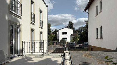 Erstbezug! Hochwertige 3-Zimmer-Neubauwohnung mit großer Terrasse im EG