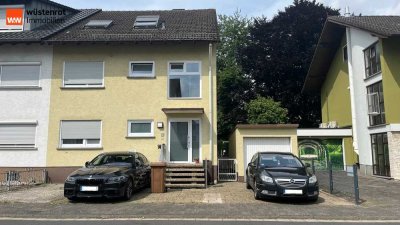 Erdgeschosswohnung mit großem Garten und Garage als Kapitalanlage