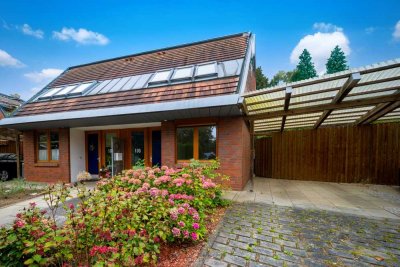 Familienfreundliches Massivhaus mit ausgebautem Studio, Terrasse, Carport und gepflegtem Garten