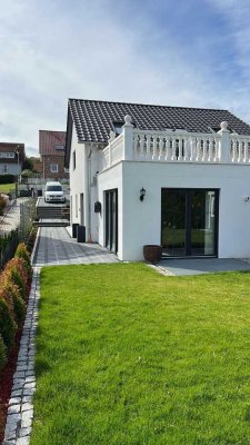 Exklusives Wohnen neu definiert: Modernes Einfamilienhaus mit bester Ausstattung