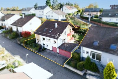 Wohnen mit Freiraum: Gepflegtes Zweifamilienhaus mit Garten