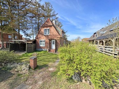 Stockelsdorf - renovierungsbedürftiges Siedlungshäuschen mit Teilkeller, Carport und großem Garten s