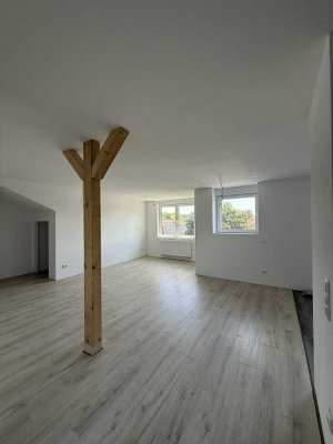 Erstbezug! Moderne 2-Zimmer-Dachgeschosswohnung mit Garten-Mitbenutzung