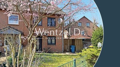 Perfekt für Familien – "Spielstraße": Geräumiges Endreihenhaus mit Kamin und Keller!