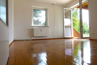 Schöne, modernisierte 4-Zimmer-Terrassenwohnung mit eigenem Gartenanteil