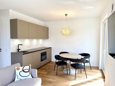Wunderschöne, hochwertig möblierte 2 - Zimmer Wohnung mit 3 Balkonen in Neubau