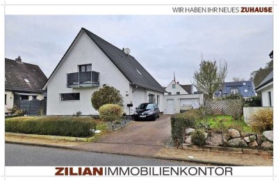 Techau: Gepflegtes Einfamilienhaus mit Einliegerwohnung und Garage in ruhiger Lage