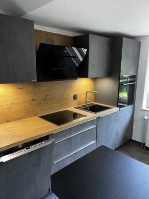 Vollständig renovierte 2-Zimmer-Dachgeschosswohnung mit Balkon und Einbauküche in Bad Nenndorf