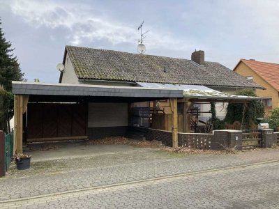 Einfamilienhaus mit Doppel-Carport und Nebengebäude in Ummern – Viel Platz für Ihre Ideen!