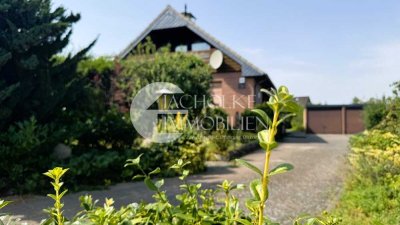 Charmantes Zuhause in ruhiger Lage – Einfamilienhaus mit Balkon, Terrasse und Garage