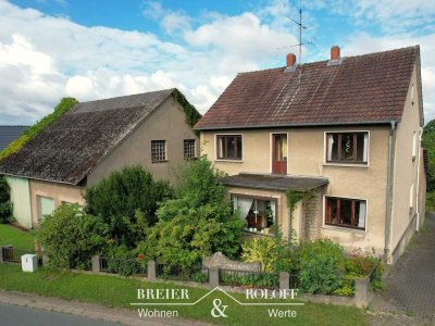 Die besondere Immobilie: Einfamilienhaus mit Lagerhallen in Holzhausen