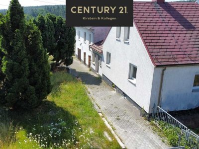 Sanierungsbedürftige Doppelhaushälfte mit großem Garten und viel Potenzial