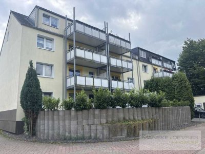 Renoviertes Mehrfamilienhaus mit 15 Wohneinheiten, Eiscafé und großzügigem Garagenhof