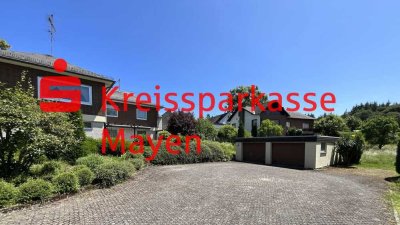 Wohnen, wo andere Urlaub machen. Winkelbungalow mit Doppelgarage.