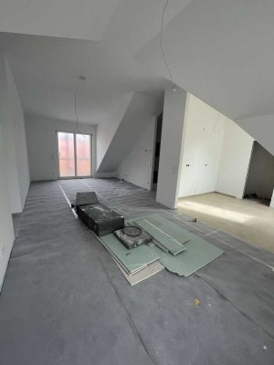 Lichtdurchflutete 3-Zimmer-Wohnung im Dachgeschoss mit Einbauküche