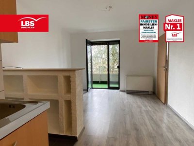 Moderne Erdgeschosswohnung mit Balkon und Tiefgaragenstellplatz