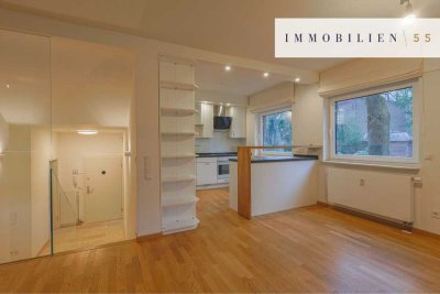 Wohnen auf zwei Ebenen: Stilvolle 4-Zimmer Wohnung mit Balkon und Terrasse in idyllischer Lage