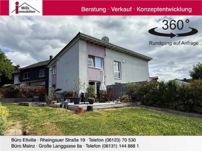 Großzügiges Architektenhaus mit Einliegerwohnung in schöner Ortsmittelage mit tollem Garten un