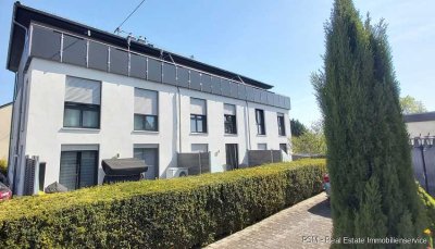 Exklusives und modernes Niedrigenergie Reihenmittelhaus mit Terrasse und Garten in bevorzugter Lage