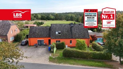 Einfamilienhaus mit großem Grundstück und Ladenfläche