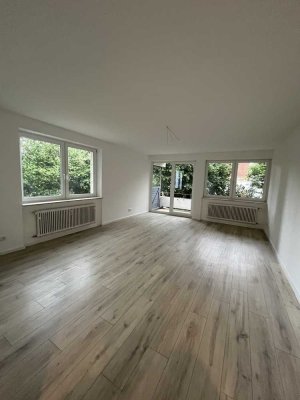 Wohngenuss mit Garten: Sanierte 4-Zimmer-Wohnung im Hochparterre