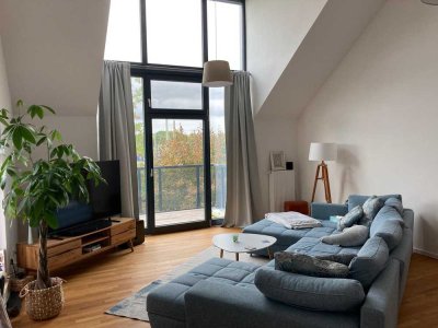 Lichtdurchflutete 2-Zimmer-Wohnung mit Einbauküche, Balkon und Stellplatz in historischem Gebäude