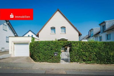 Eschborn: Freistehendes Einfamilienhaus mit Wohlfühlcharakter und gepflegtem Garten