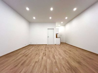 Zentrales Einzimmer-Apartment mit Küchenzeile und Außenstellplatz in der Augsburger Innenstadt