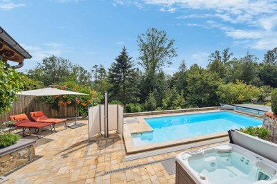 EIN ORT ZUM VERLIEBENMehrfamilienhaus mit traumhaftem Garten zwischen Passau und Schärding