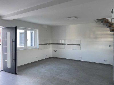 Schöne Maisonettewohnung mit Balkon und Garten.