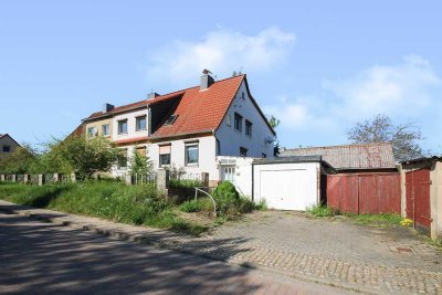 Großzügige Doppelhaushälfte in Ummendorf:  Ihr Projekt mit Potenzial!