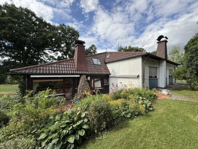 Familienparadies mit Potenzial: Zweifamilienhaus, weitläufiges Grundstück & Nebengebäude- Wiesengrun