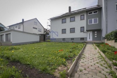 Charmante 4-Zimmerwohnung im ersten Obergeschoss mit Balkon und Gartenanteil