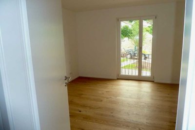 Erstbezug mit Balkon und Einbauküche: Stilvolle 4-Zimmer-Wohnung mit geh. Innenausstattung