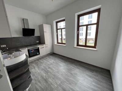 2 Zimmer-Wohnung mit Einbauküche und Parkplatz