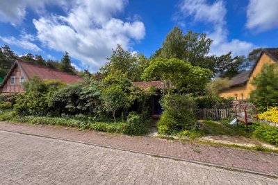 Sanierungsobjekt mit Herz: Bungalow mit 2 SZ sowie einem Garten, Wintergarten & Carport in Düshorn